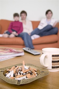 family sitting on the sofa