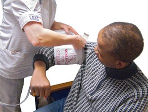 man having his blood pressure taken