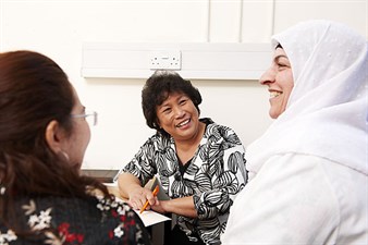 three women smiling