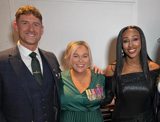 Exceptional NHS colleague and ex-army medic of 20 years carries Book of Remembrance at national service following her selfless efforts to save lives during war explosion incident